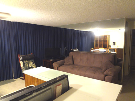 living room with mirrors.